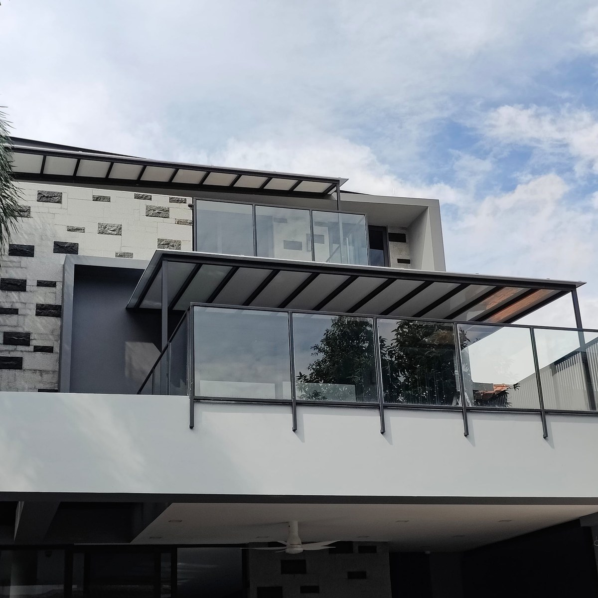 Glass roof extension on a landed home